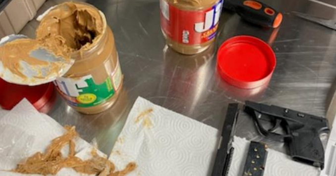 RI man arrested JFK Airport security finds gun parts inside peanut