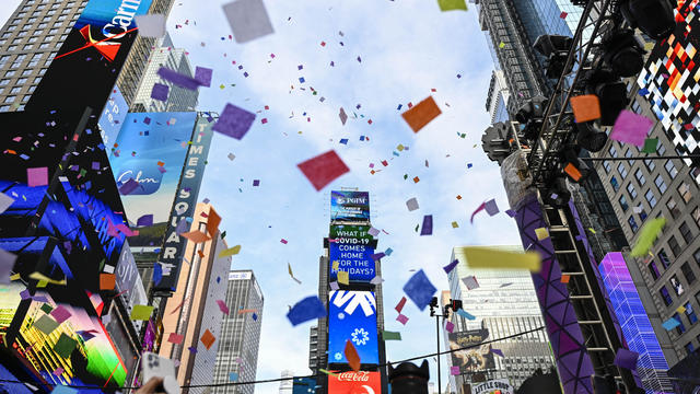 People watch and cheer as confetti is released during a confetti test ahead of New Year's Eve in Times Square on December 29, 2022 in New York City, United States. 