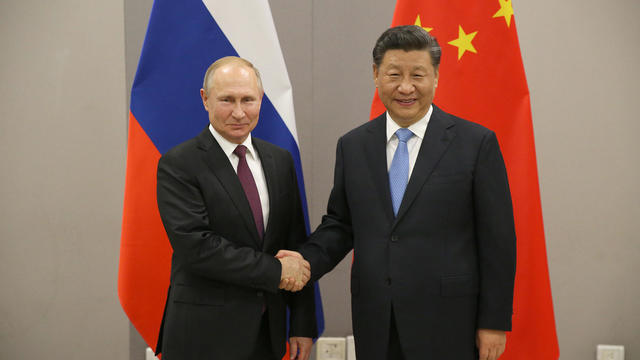 Russian President Vladimir Putin meets Chinese President Xi Jinping at BRICS Summit in Brasilia 