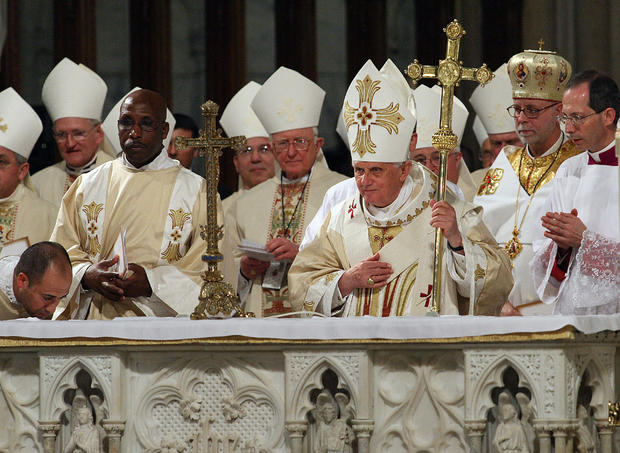 Pope Benedict XVI (3rd R) celebrates Mas 