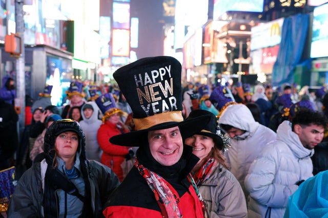 A person wearing a hat celebrates in Times Square during the first New Year's Eve event without restrictions since the coronavirus pandemic in the Manhattan borough of New York City, December 31, 2022.