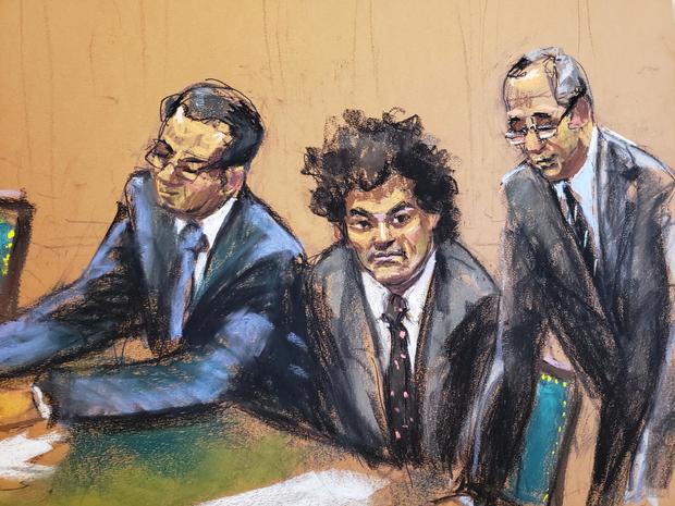 Court sketch of Sam Bankman-Fried between attorneys 