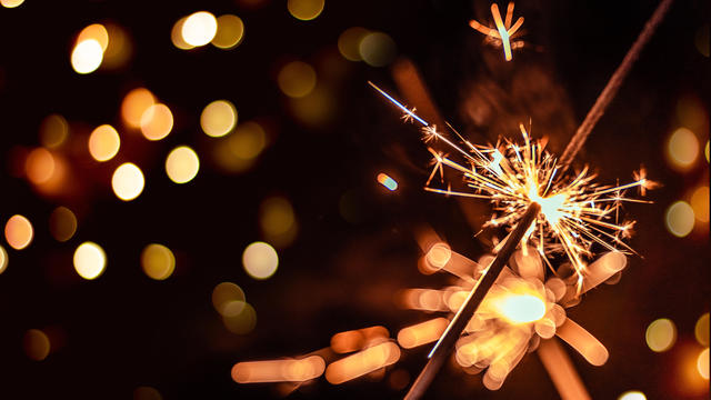 Festive burning sparkles at New Year celebration party 