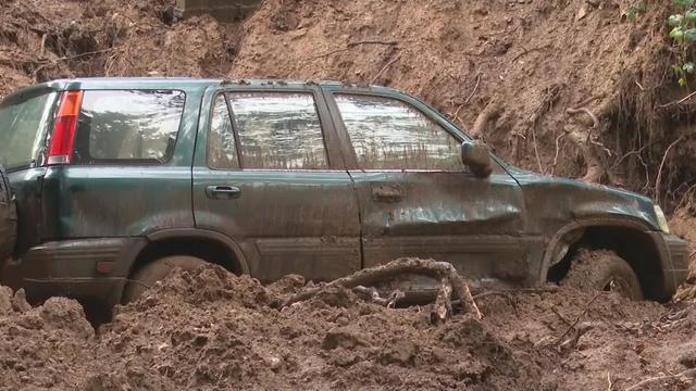 Car buried from mud slide in Santa Cruz Mountains 