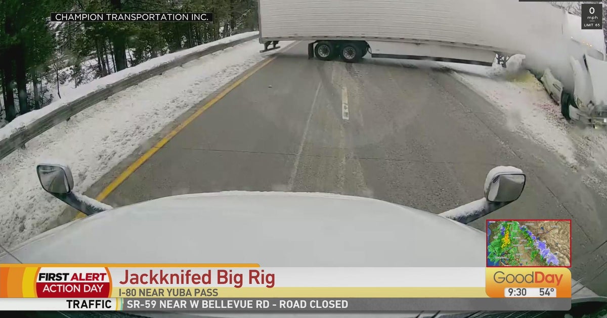 Jackknifed big rig crashes after driving with no chains