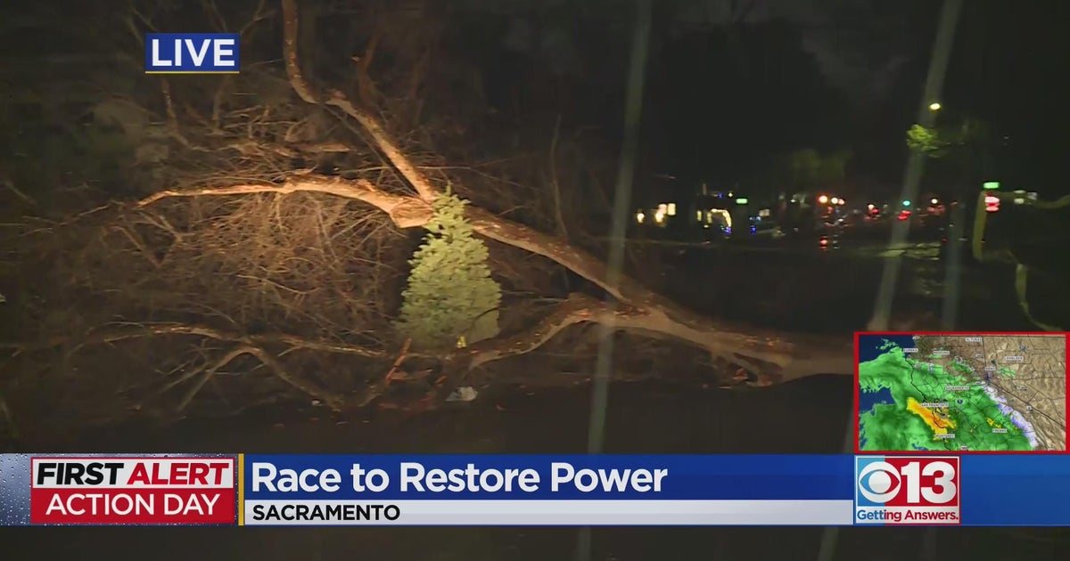 Emergency crews work to restore power to people living near 24th and Q Street