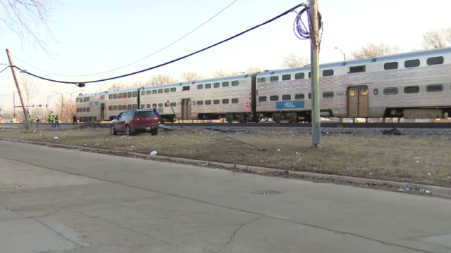 Metra Rock Island train hits car 