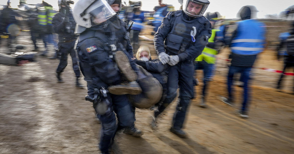 Climate activists clash with police as German ghost town set to be engulfed by coal mine