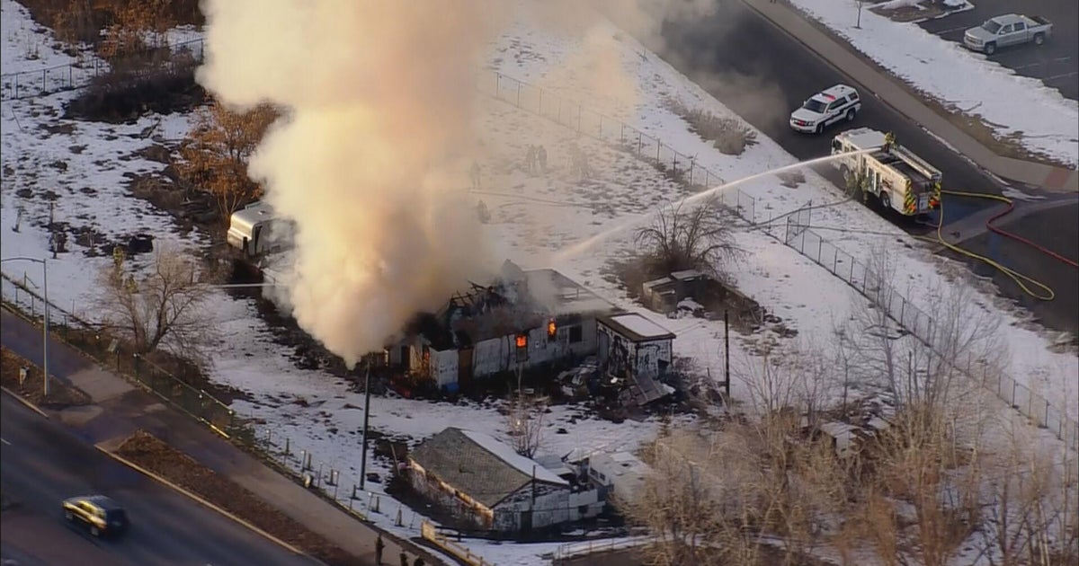 Firefighters rush to put out burning building on West 92nd Avenue CBS