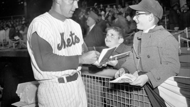 New York Mets opening day at Polo Grounds. Laddie Ross, 9, a 