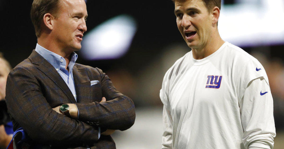 New York Giants quarterback Eli Manning gets face masked in the first  quarter. The New York Giants hosted the New Orleans Saints in week 2 for Monday  Night Football at Giants Stadium