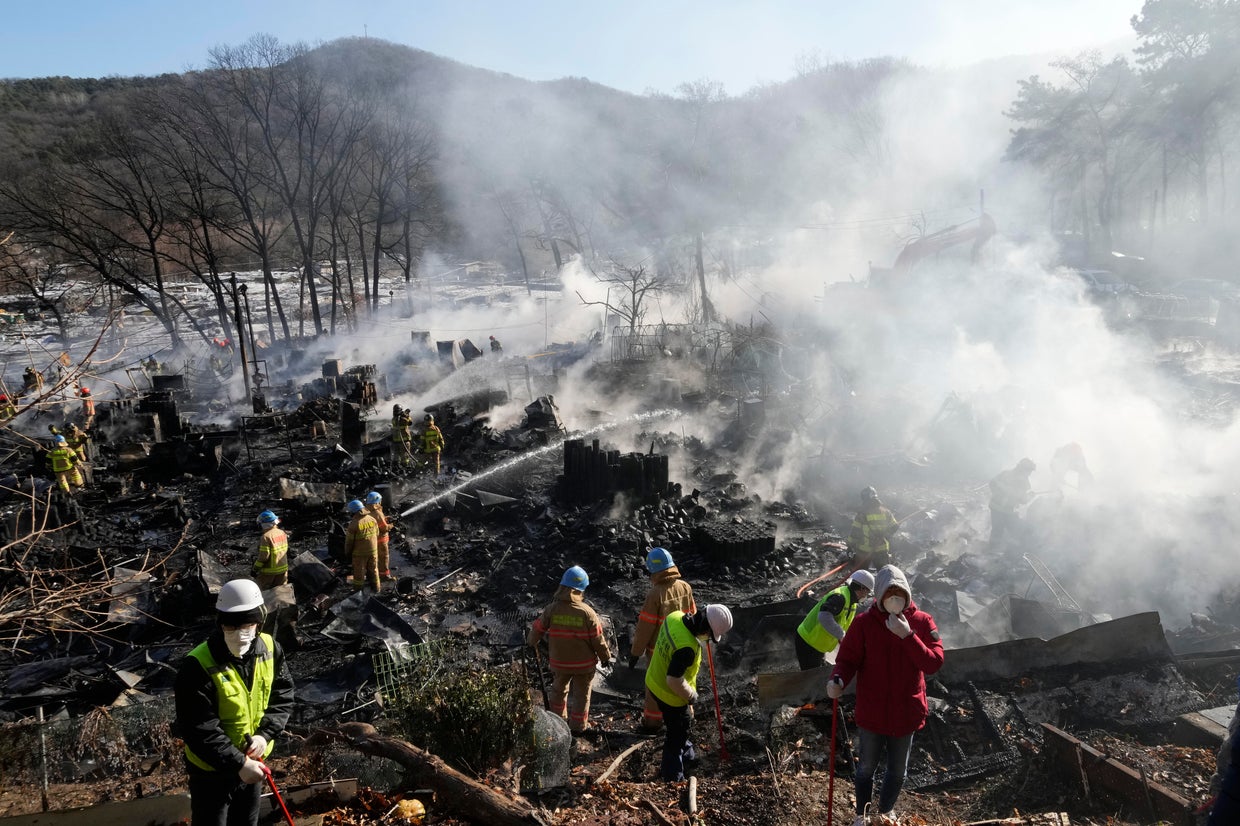 Fire tears through illegal home encampment on edge of South Korea's