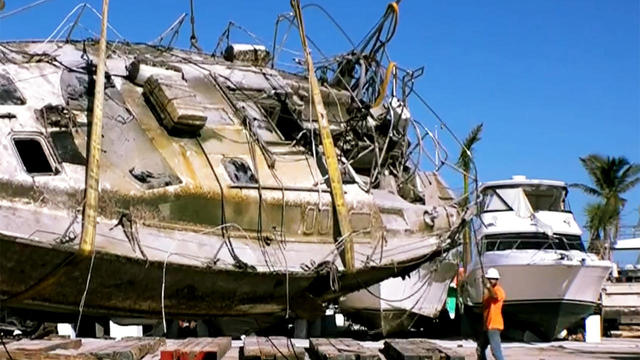 Recovering boats left derelict by Hurricane Ian