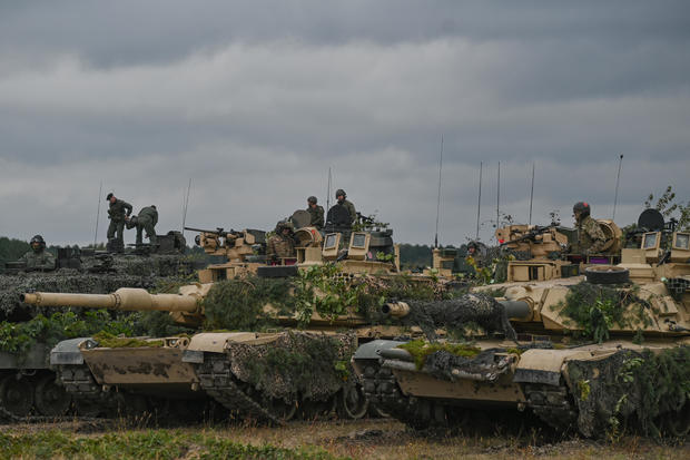 M1 Abrams, a third-generation American main battle tank, are seen at the end of the joint military exercises, at the training ground in Nowa Deba.  