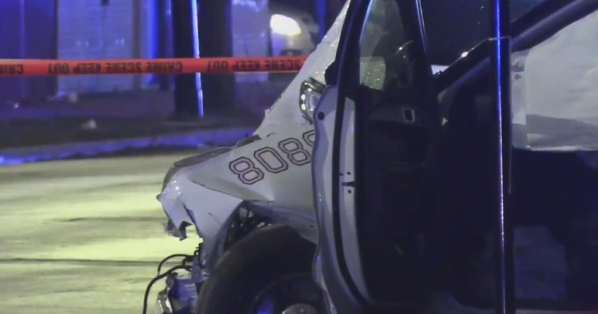 Two officers injured when squad car hits box truck - CBS Chicago