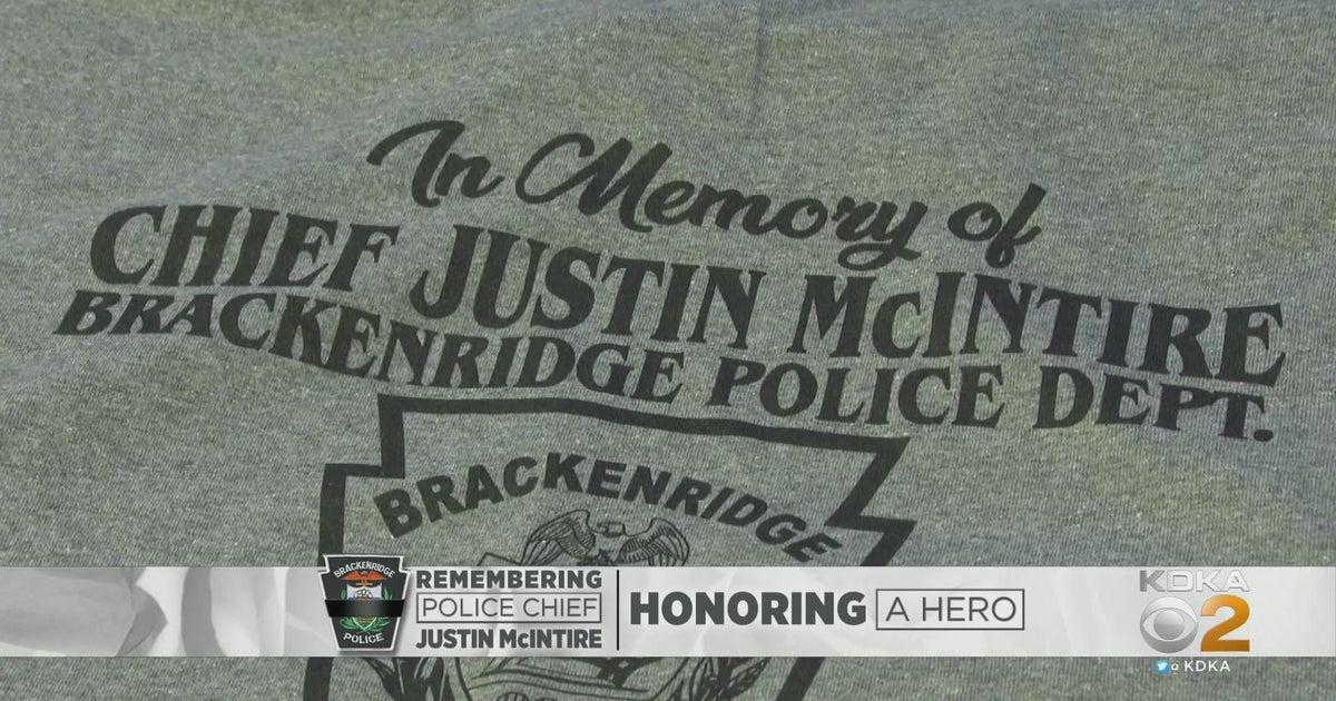 Volunteers sell shirts to support the family of fallen Brackenridge