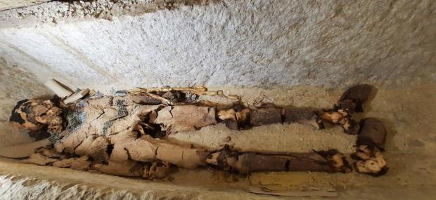 Oldest non-royal mummy ever discovered in Egypt found at bottom of deep shaft, wrapped in gold
