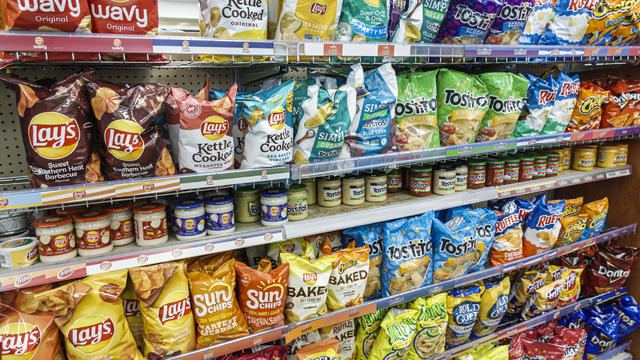 Miami Beach, Florida, convenience store junk food potato chips snack food display 