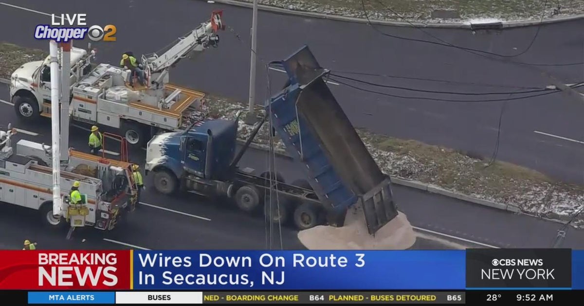 Dump truck takes down wires on Route 3 in Secaucus - CBS New York