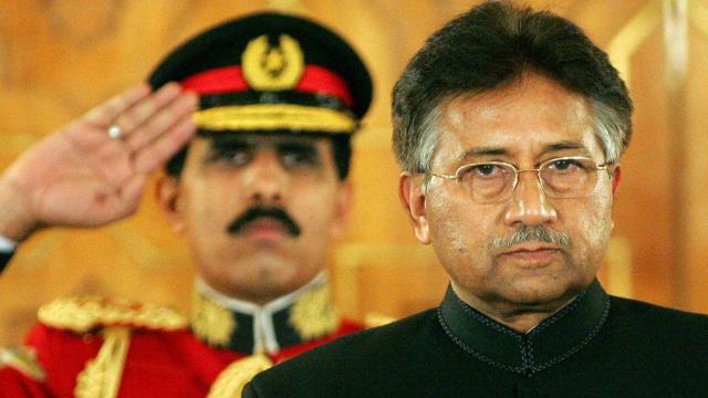 In this file photo taken on Nov. 29, 2007, Pakistani President Pervez Musharraf stands after taking the oath as a civilian president at the presidential palace in Islamabad. 