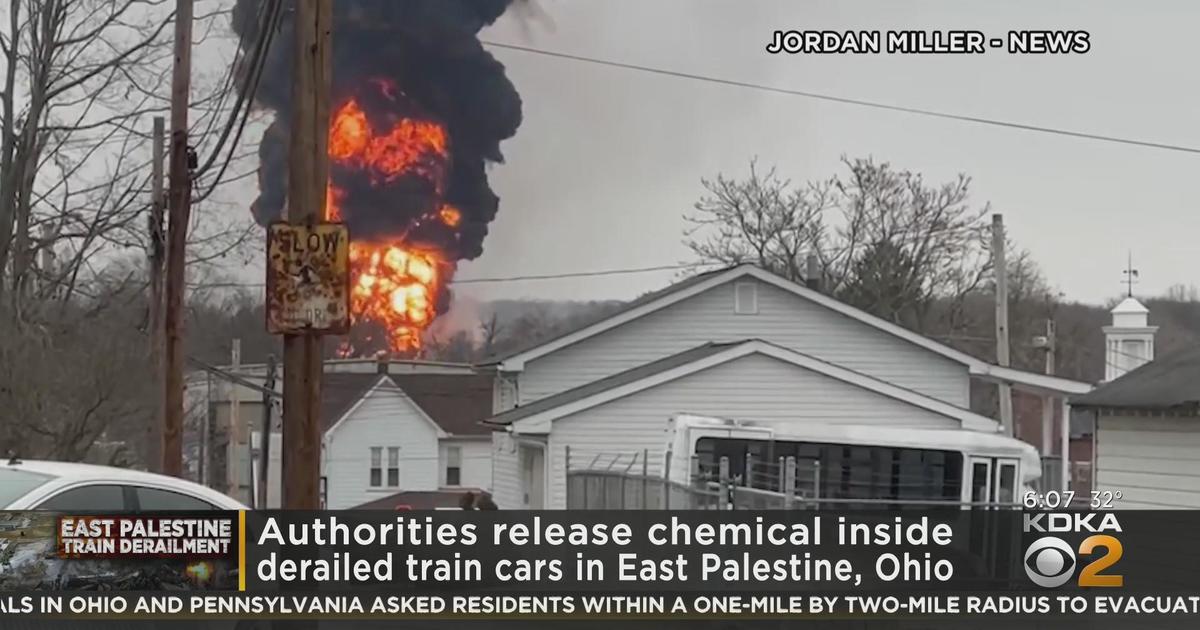 Authorities release chemicals inside derailed train cars