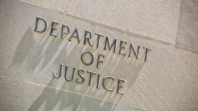 Building Entrance Sign for the Department of Justice in Washington DC 