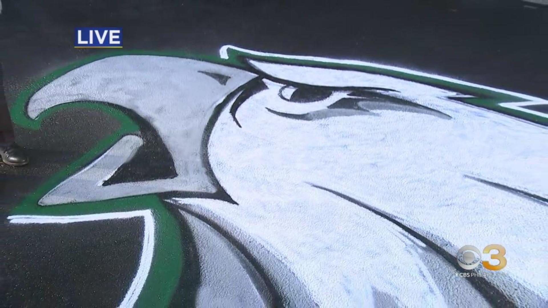 Philadelphia artist painting Eagles logos on fans' lawns - CBS Philadelphia