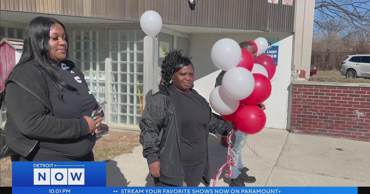 Family friends release balloons to remember honor Cartier Woods