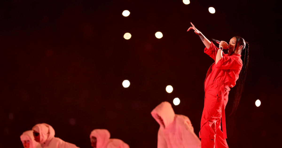 Rihanna Soars In Super Bowl Halftime Show; Reveals New Baby Bump