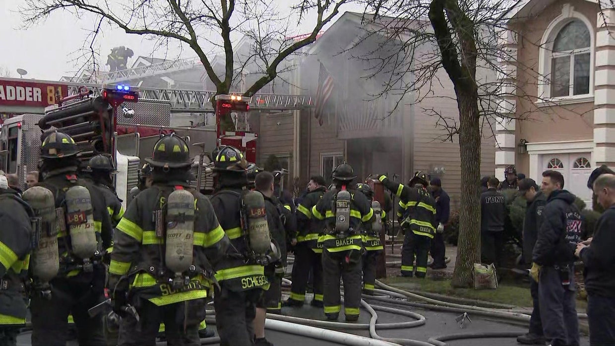 Nearly 2 dozen firefighters injured battling New York house fire CBS News
