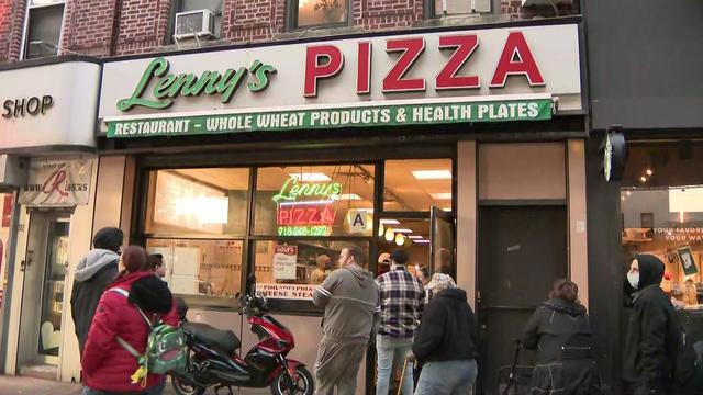 Customers line up outside Lenny's Pizza in Brooklyn. 