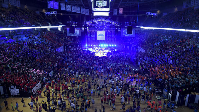 People dance together during the Penn State Dance Marathon, THON, which raises money for the Four Diamonds fund benefiting children's cancer patients and research. Photo by Natalie Kolb 2/20/2016 