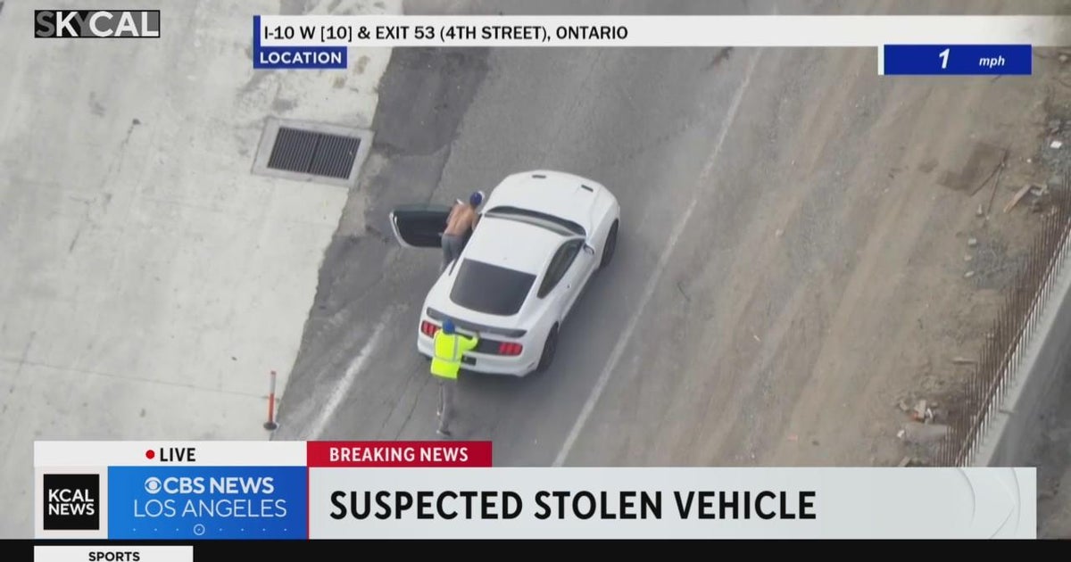 Stolen vehicle chase ends with suspect and a bystander pushing the car ...