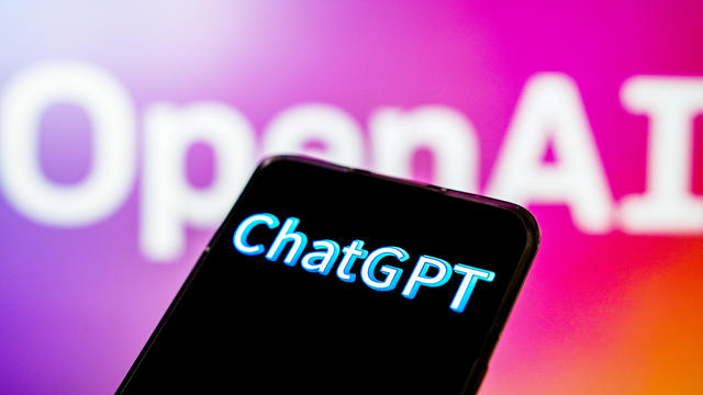 In this photo illustration, a ChatGPT logo is displayed on 