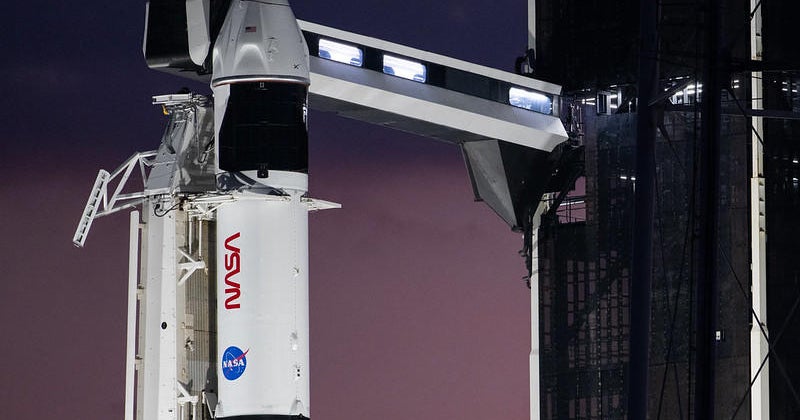 A four-man crew’s launch to a space station on a SpaceX rocket is aborted just before takeoff