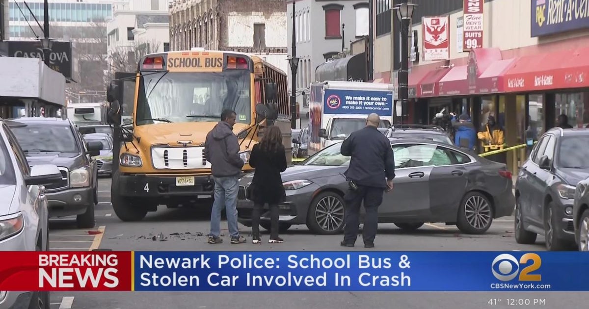 Newark school bus collides with stolen car - CBS New York