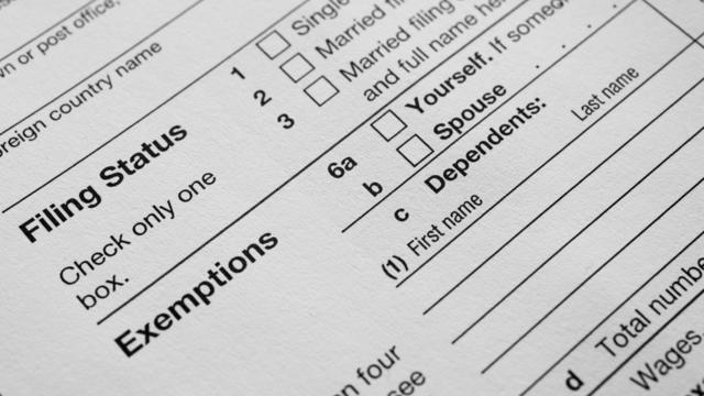 US Income tax return close up filing status and exemptions 
