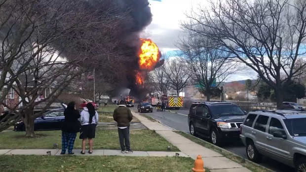 Driver killed in tanker explosion on Maryland freeway; fire damages nearby homes 