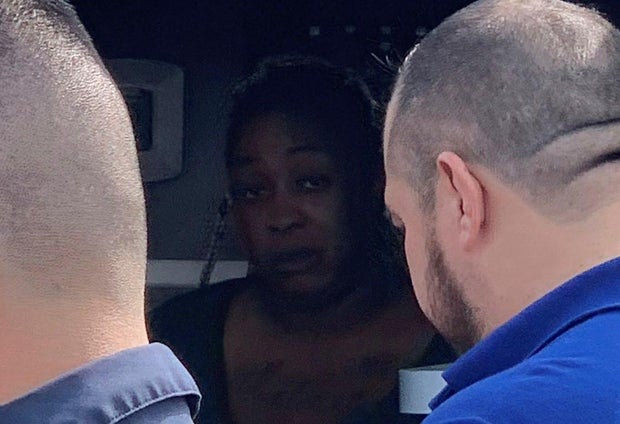 An American woman who was abducted in Mexico sits inside an ambulance after she was found alive in Ejido Longoreno, on the outskirts of Matamoros, Mexico, March 7, 2023. 