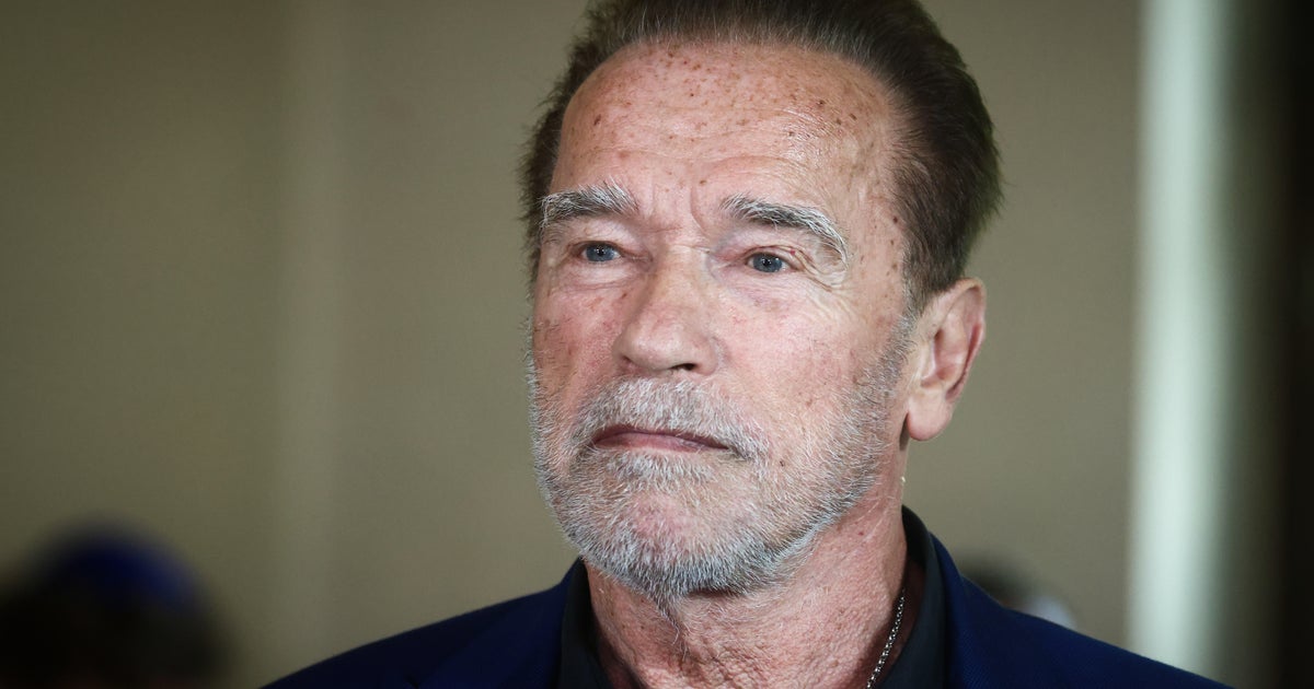 Arnold Schwarzenegger warns those on a "path of hate" and antisemitism, they could end up a "loser" like his Nazi father