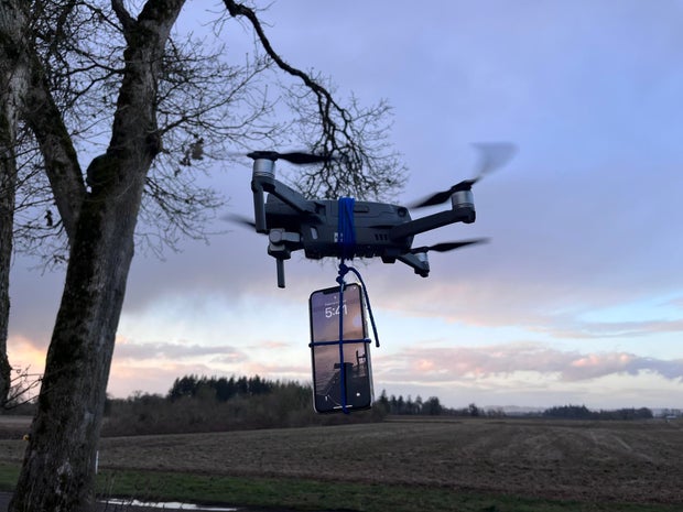 A reenactment set up by authorities of how the stranded motorist used his drone. 