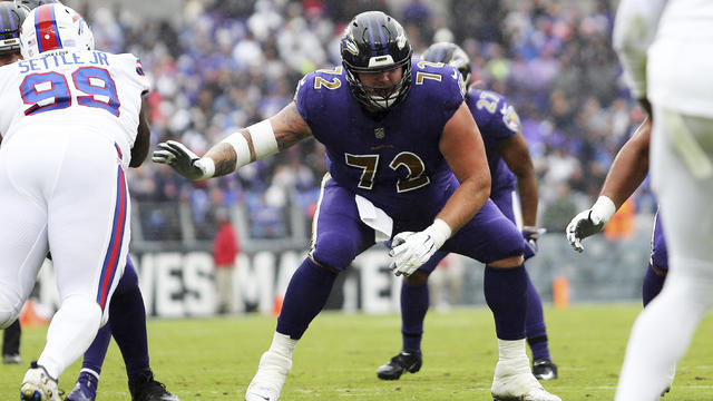 Denver Broncos guard Ben Powers, right, squares off against guard