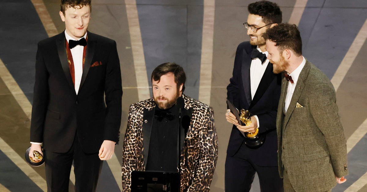 Oscars audience sings "Happy Birthday" to James Martin, actor with Down syndrome, as he accepts award