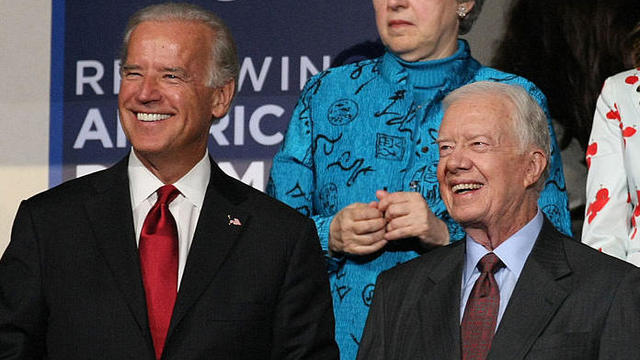 Then-Sen. Joe Biden and former president Jimmy Carter watch the proceedings on day two of the Democratic National Convention at the Pepsi Center on Aug. 26, 2008, in Denver, Colorado. 