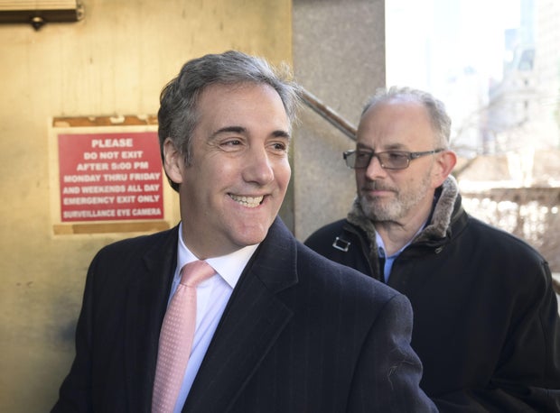 Michael Cohen walks out of a Manhattan courthouse after testifying before a grand jury on March 15, 2023.
