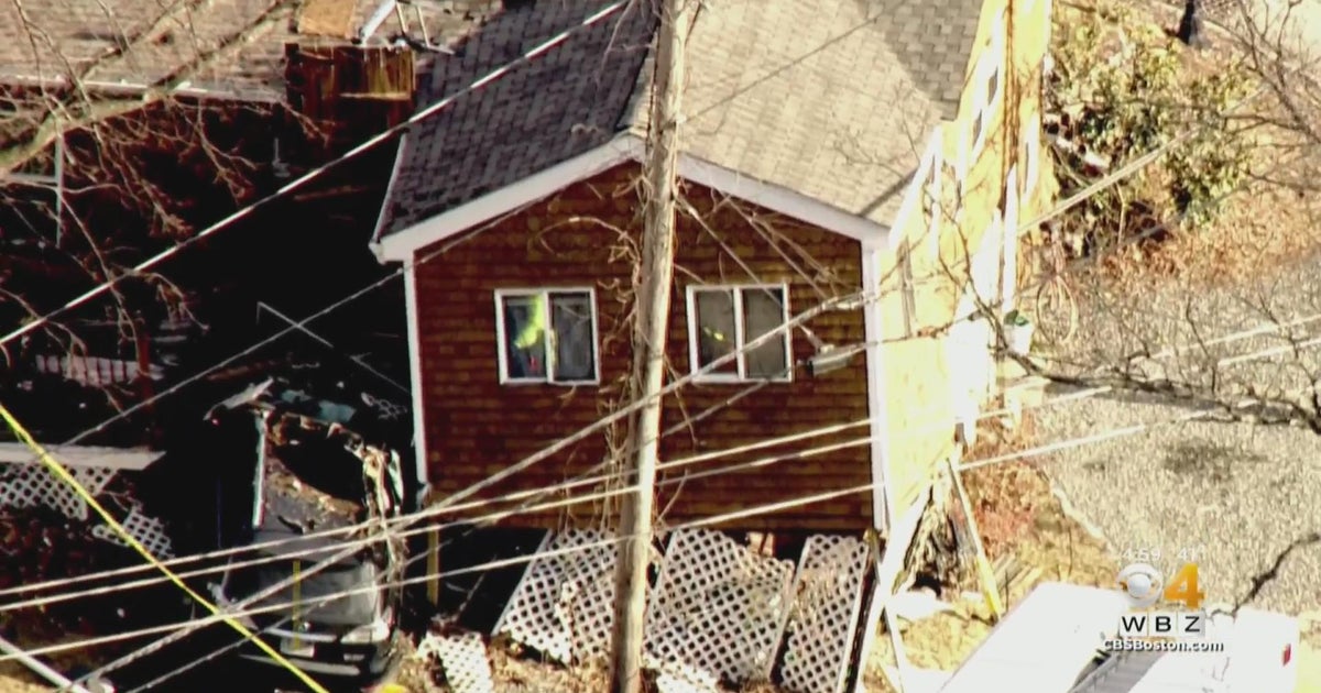 Car crashes into home in Grafton - CBS Boston