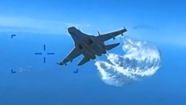 cbsn-fusion-video-shows-mid-air-confrontation-between-russian-jets-and-us-drone-over-the-black-sea-thumbnail-1802027-640x360.jpg 