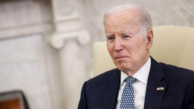 President Biden speaks to journalists before a meeting with Irish Taoiseach Leo Varadkar in the Oval Office of the White House on March 17, 2023. 