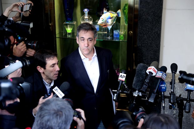 Michael Cohen addresses the press as he leaves his apartment to begin serving a 3-year sentence at a federal prison in New York on May 6, 2019.