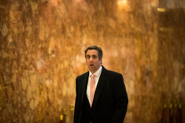 Michael Cohen walks through the lobby at Trump Tower in New York on Jan. 12, 2017.